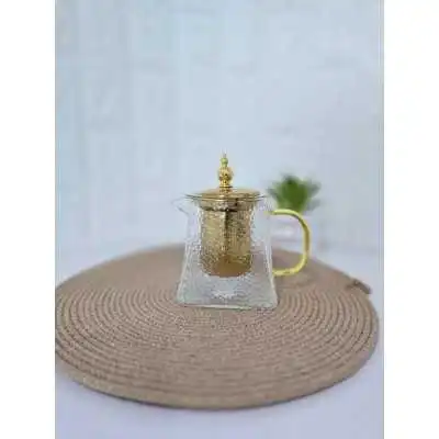 THÉIÈRE EN VERRE ET EN MÉTAL DORÉ - 1